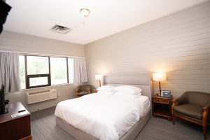 A guestroom at a top South Algonquin resort is the perfect place to escape to after exploring the things to do in Haliburton.